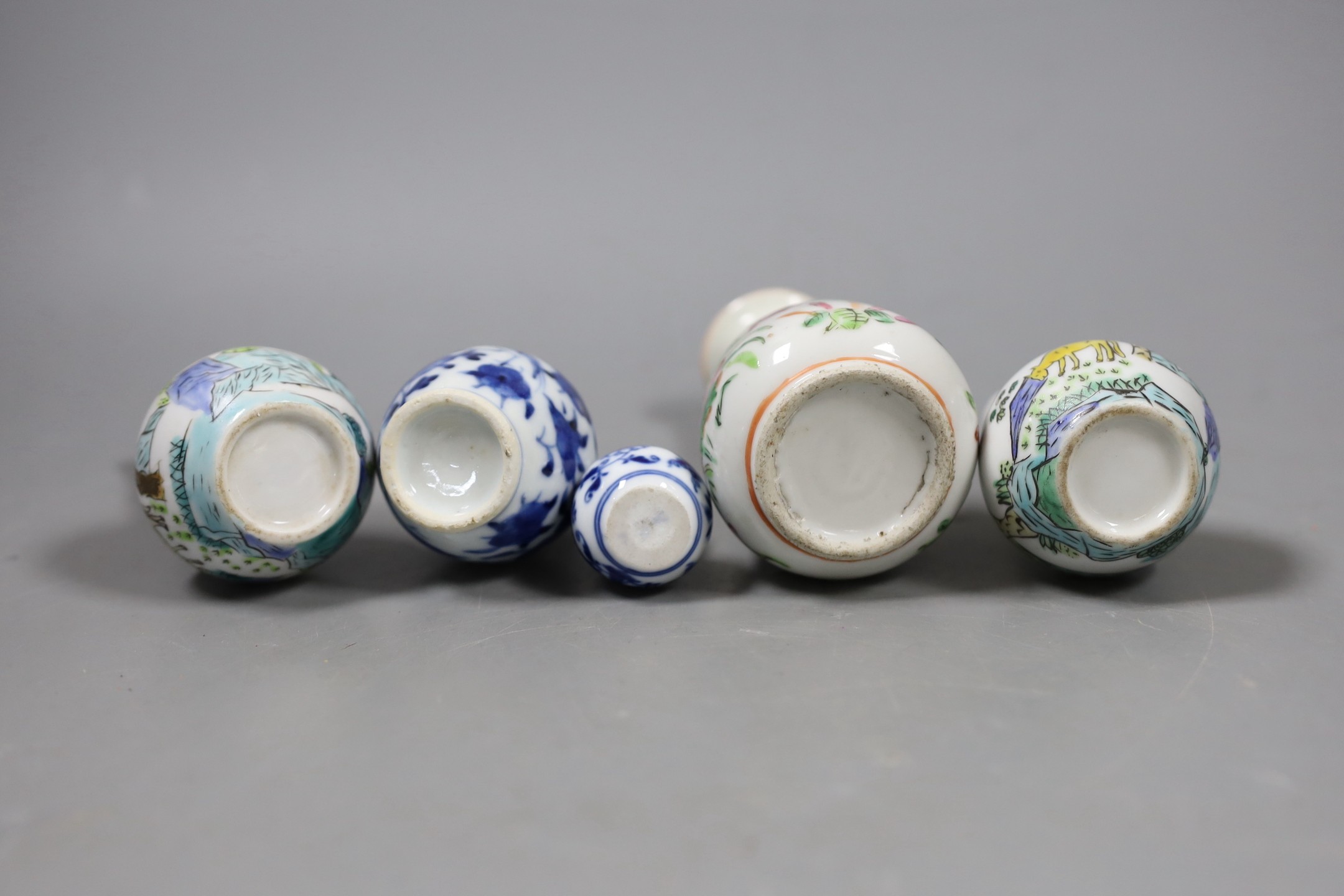 A group of Chinese miniature porcelain bottle vase, 19th/20th century and a Meissen miniature onion pattern vase. Tallest 12cm